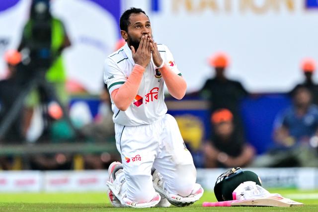 (FILES) Bangladesh's Mushfiqur Rahim celebrates after scoring a century (100 runs) during the first day of the first Test cricket match between Sri Lanka and Bangladesh at the Galle International Cricket Stadium in Galle on June 17, 2025. Mushfiqur on November 20 became the first Bangladeshi batsman to score a century in his 100th Test, achieving the milestone in the second and final Test against Ireland in Mirpur. (Photo by Ishara S. KODIKARA / AFP)