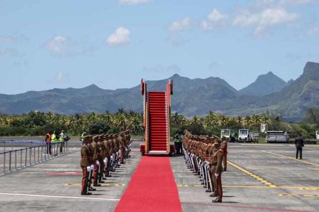 The Mauritian guard of honour lines up ahead of the arrival of France's President Emmanuel Macron for his visit to Mauritius, at the Sir Seewoosagur Ramgoolam International Airport in Port Louis on November 20, 2025. (Photo by Ludovic MARIN / AFP)