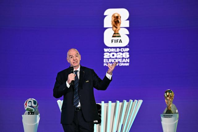 FIFA President Gianni Infantino speaks during the 2026 FIFA World Cup European Play-Off draw at the FIFA's Home of Football in Zurich on November 20, 2025. (Photo by Fabrice COFFRINI / AFP)