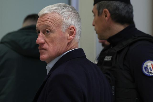 France's football team head coach Didier Deschamps arrives at the Criminal Court for the slander lawsuit against French Sports journalist Daniel Riolo in Paris on November 20, 2025. Riolo is facing trial on November 20, 2025 for slander after accusing France's national football team headcoach Didier Deschamps of "lying" about the severity of France's forward Karime Benzema's injury during the 2022 World Cup in Qatar. (Photo by Anne-Christine POUJOULAT / AFP)
