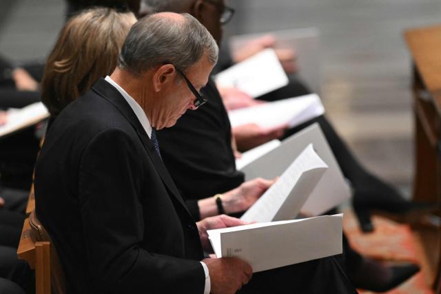 (L-R) US Supreme Court, Chief Justice John G. Roberts attends the funeral service for late US Vice President Dick Cheney at the Washington National Cathedral in Washington, DC, on November 20, 2025. (Photo by SAUL LOEB / AFP)