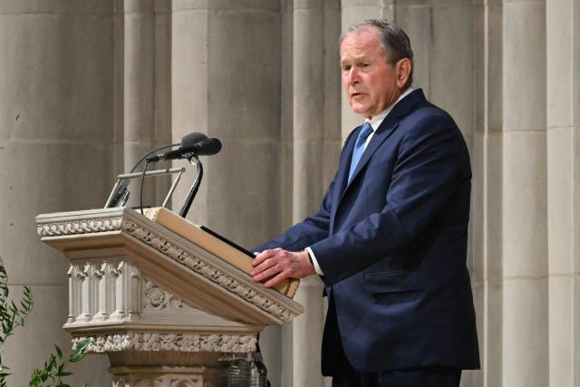 Former US President George W. Bush speaks during the funeral service for late US Vice President Dick Cheney at the Washington National Cathedral in Washington, DC, on November 20, 2025. Dick Cheney, celebrated as a master Republican strategist but defined by the darkest chapters of America's "War on Terror," was honored Thursday in a funeral attended by Washington's elite that pointedly left out President Donald Trump. (Photo by SAUL LOEB / AFP)