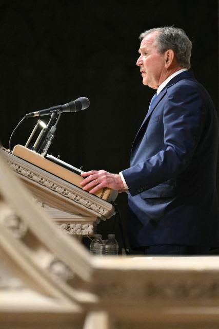 Former US President George W. Bush speaks during the funeral service for late US Vice President Dick Cheney at the Washington National Cathedral in Washington, DC, on November 20, 2025. Dick Cheney, celebrated as a master Republican strategist but defined by the darkest chapters of America's "War on Terror," was honored Thursday in a funeral attended by Washington's elite that pointedly left out President Donald Trump. (Photo by SAUL LOEB / AFP)