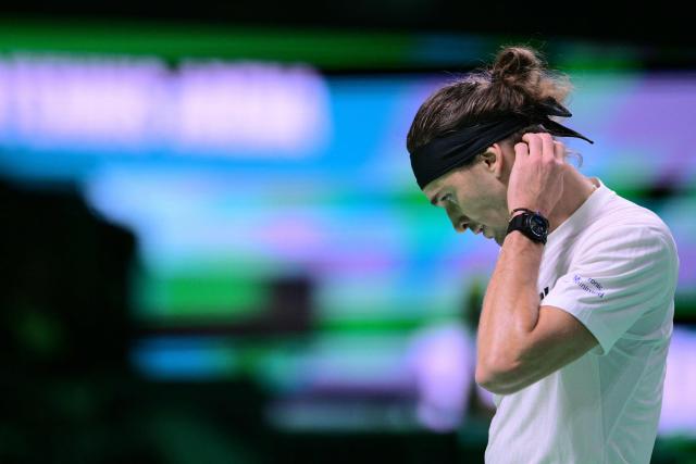 Germany's Alexander Zverev reacts during his Davis Cup men's singles quarter finals tennis match against Argentina's Francisco Cerundolo, at the Super Tennis Arena, in Bologna, northen Italy, on November 20, 2025. (Photo by Tiziana FABI / AFP)