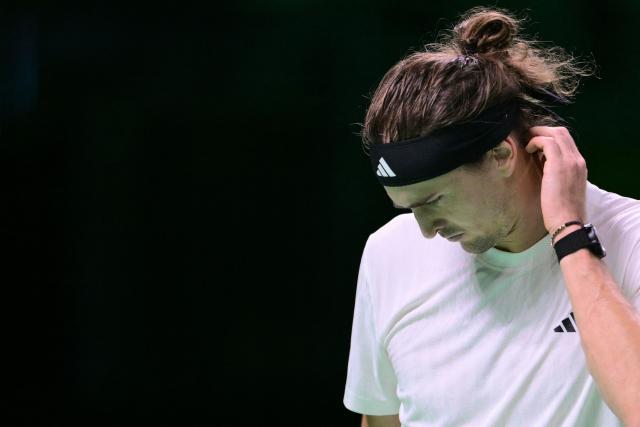 Germany's Alexander Zverev reacts during his Davis Cup men's singles quarter finals tennis match against Argentina's Francisco Cerundolo, at the Super Tennis Arena, in Bologna, northen Italy, on November 20, 2025. (Photo by Tiziana FABI / AFP)