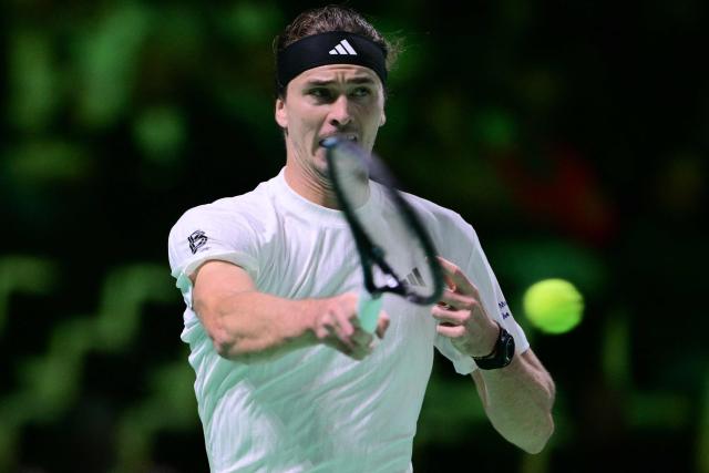Germany's Alexander Zverev returns the ball to Argentina's Francisco Cerundolo during the Davis Cup men's singles quarter finals tennis match, at the Super Tennis Arena, in Bologna, northen Italy, on November 20, 2025. (Photo by Tiziana FABI / AFP)