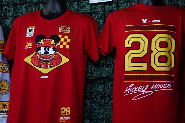 Disney Formula One merchandise is seen for sale in the paddock ahead of the first practice session for the Las Vegas Formula One Grand Prix at the Las Vegas Strip Circuit in Las Vegas, Nevada, on November 20, 2025. (Photo by Patrick T. Fallon / AFP)