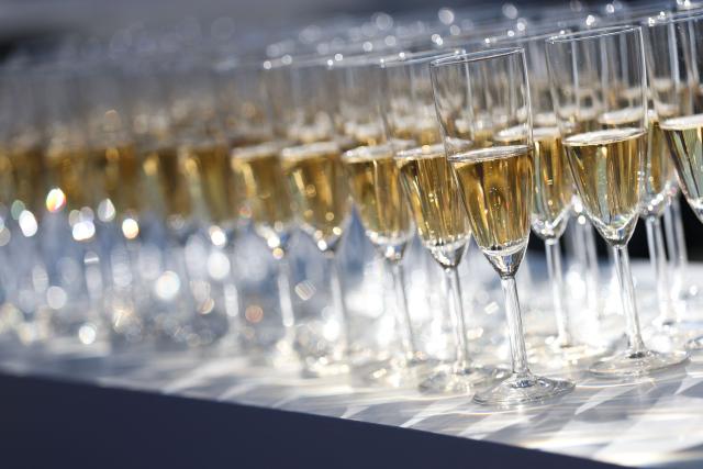 Champagne is available for guests in the paddock ahead of the first practice session for the Las Vegas Formula One Grand Prix at the Las Vegas Strip Circuit in Las Vegas, Nevada, on November 20, 2025. (Photo by Patrick T. Fallon / AFP)