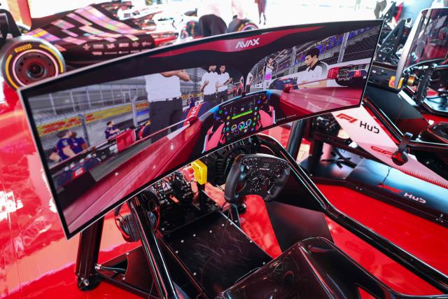 Racing simulators are available for guests on the rooftop of the paddock ahead of the first practice session for the Las Vegas Formula One Grand Prix at the Las Vegas Strip Circuit in Las Vegas, Nevada, on November 20, 2025. (Photo by Patrick T. Fallon / AFP)