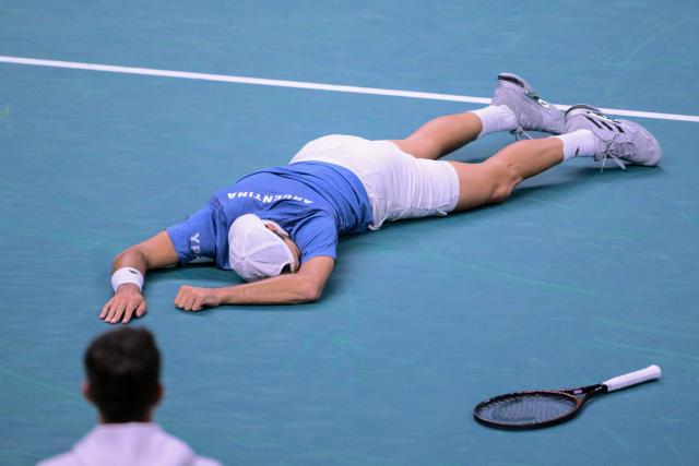 Argentina's Francisco Cerundolo reacts at the end of his match against Germany's Alexander Zverev during the Davis Cup men's singles quarter finals tennis match, at the Super Tennis Arena, in Bologna, northen Italy, on November 20, 2025. (Photo by Tiziana FABI / AFP)