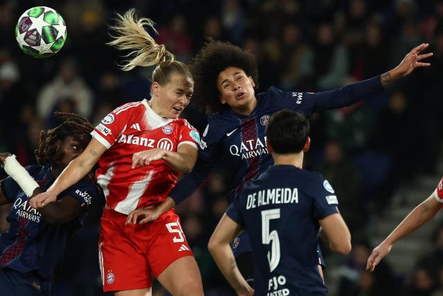 Bayern Munich's Swedish defender #05 Magdalena Eriksson (CL) and PSG's Brazilian midfielder #08 Vitoria Yaya (CR) fight for the ball in the air during the UEFA Women's Champions League first round day 4 football match between Paris Saint-Germain (FRA) and Bayern Munich (GER) at the Parc des Princes stadium in Paris on November 20, 2025. (Photo by FRANCK FIFE / AFP)