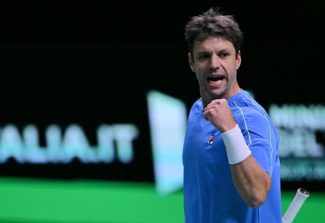 Argentina's Horacio Zeballos reacts during his match with Argentina's Andres Molteni against Germany's Kevin Krawietz and Germany's Tim Puetz during their Davis Cup men's doubles quarter finals tennis match, at the Super Tennis Arena, in Bologna, northen Italy, on November 20, 2025. (Photo by Tiziana FABI / AFP)