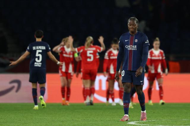 PSG's Congolese striker #30 Merveille Kanjinga (2R) reacts after conceding Bayern's third goal during the UEFA Women's Champions League first round day 4 football match between Paris Saint-Germain (FRA) and Bayern Munich (GER) at the Parc des Princes stadium in Paris on November 20, 2025. (Photo by FRANCK FIFE / AFP)