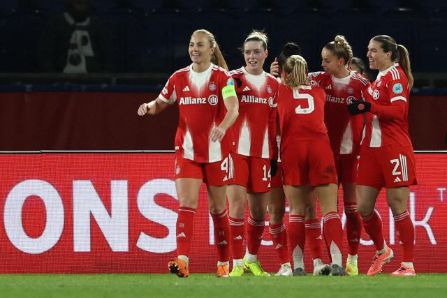 Bayern's players celebrate after scoring their third goal during the UEFA Women's Champions League first round day 4 football match between Paris Saint-Germain (FRA) and Bayern Munich (GER) at the Parc des Princes stadium in Paris on November 20, 2025. (Photo by FRANCK FIFE / AFP)