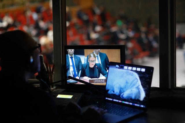 Ambassador Khrystyna Hayovyshyn, Permanent Representative of Ukraine to the UN, is seen on a screen as she speaks during a UN Security Council meeting on Ukraine at the UN Headquarters in New York City, November 20, 2025. (Photo by kena betancur / AFP)