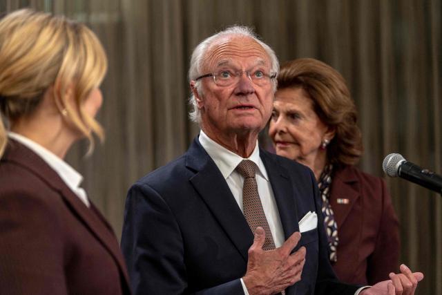 (L/R) Deputy Prime Minister of Sweden Ebba Busch, King Carl XVI Gustaf and Queen Silvia of Sweden take part in a press conference at the Montreal Airport in Montreal, Canada, on November 20, 2025. The Swedish royal family arrived in Canada on November 18 to begin a three-day state visit. (Photo by ANDREJ IVANOV / AFP)
