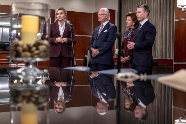 (L/R) Deputy Prime Minister of Sweden Ebba Busch, King Carl XVI Gustaf and Queen Silvia of Sweden and Minister of Defense Pal Jonson take part in a press conference at the Montreal Airport in Montreal, Canada, on November 20, 2025. The Swedish royal family arrived in Canada on November 18 to begin a three-day state visit. (Photo by ANDREJ IVANOV / AFP)