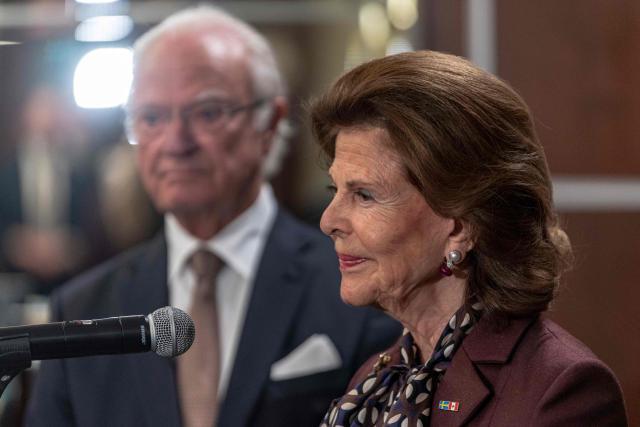 King Carl XVI Gustaf (L) and Queen Silvia of Sweden speak during a press conference at the Montreal Airport in Montreal, Canada, on November 20, 2025. The Swedish royal family arrived in Canada on November 18 to begin a three-day state visit. (Photo by ANDREJ IVANOV / AFP)