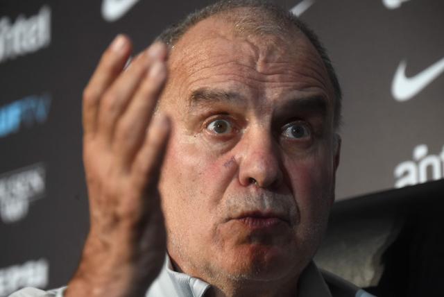 Uruguay's Argentine head coach Marcelo Bielsa gestures during a press conference in Montevideo on November 20, 2025. (Photo by DANTE FERNANDEZ / AFP)