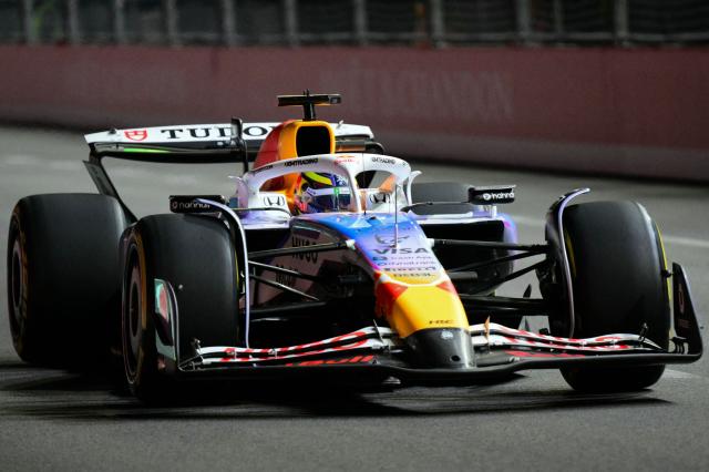 RB's French driver Isack Hadjar races during the first practice session for the Las Vegas Formula One Grand Prix at the Las Vegas Strip Circuit in Las Vegas, Nevada, on November 20, 2025. (Photo by Frederic J. Brown / AFP)