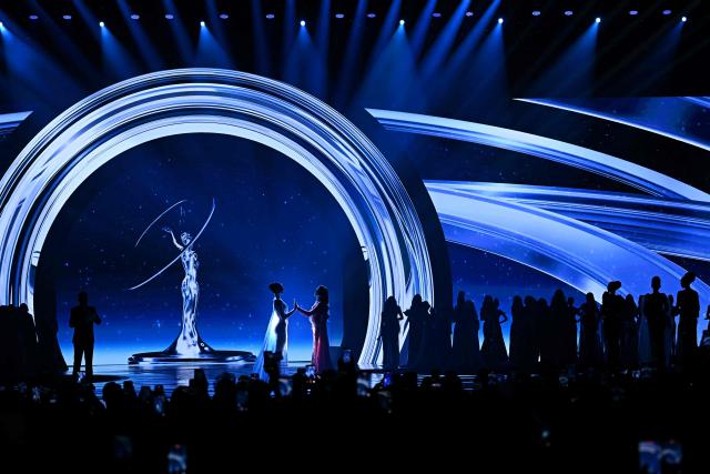 Miss Mexico Fatima Bosch (centre R) faces off with Miss Thailand Praveenar Singh (centre L) to hear the winner of the 2025 Miss Universe pageant in Nonthaburi, north of Bangkok, on November 21, 2025. (Photo by Lillian SUWANRUMPHA / AFP)