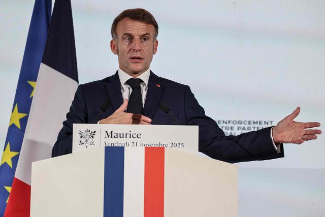 France’s President Emmanuel Macron speaks to the French community during the inauguration ceremony of the Mauritius French Embassy in Port Louis on November 21, 2025. (Photo by Ludovic MARIN / AFP)
