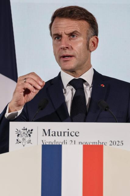 France’s President Emmanuel Macron speaks to the French community during the inauguration ceremony of the Mauritius French Embassy in Port Louis on November 21, 2025. (Photo by Ludovic MARIN / AFP)