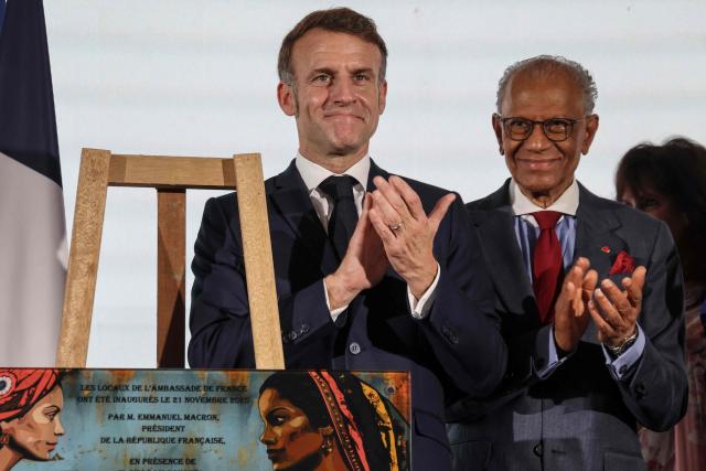France’s President Emmanuel Macron (L) and Mauritius' Prime Minister Navin Ramgoolam (R) applaud during the inauguration ceremony of the Mauritius French Embassy in Port Louis on November 21, 2025. (Photo by Ludovic MARIN / AFP)