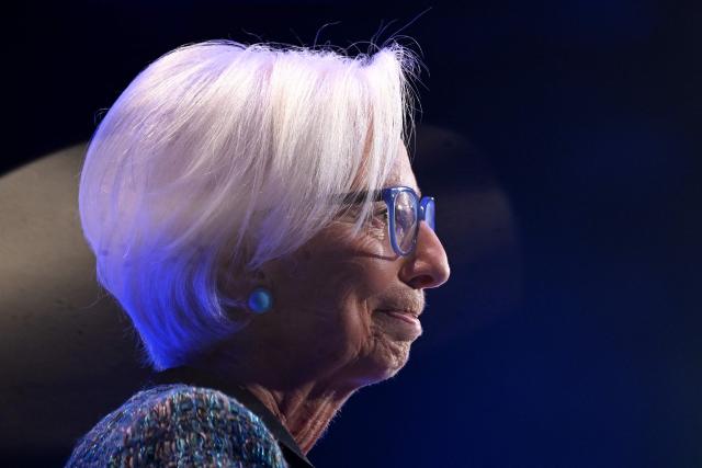 ECB head Christine Lagarde smiles as she addresses guests during the opening of the 35th Frankfurt European Banking Congress in Frankfurt am Main, Germany, on November 21, 2025. (Photo by Kirill KUDRYAVTSEV / AFP)