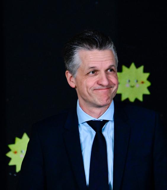 German Chief of Staff and Minister for Special Tasks Thorsten Frei attends the 'Reading-Aloud-Day', a German nationwide reading day, at the Robert Reinick primary school in Berlin's Reinickendorf district on November 21, 2025. The German chief of staff fills in for German Chancellor Merz, who was not able to attend due to 'scheduling reasons'. The motto of this year's reading day, which takes place for the 22nd time, 'Reading aloud speaks your language'. (Photo by Tobias SCHWARZ / AFP)