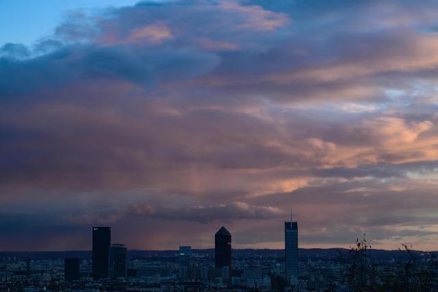 This photograph shows Lyon's skyline at sunset, in Lyon, center France on November 20,2025. (Photo by OLIVIER CHASSIGNOLE / AFP)