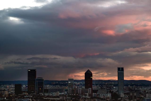 This photograph shows Lyon's skyline at sunset, in Lyon, center France on November 20,2025. (Photo by OLIVIER CHASSIGNOLE / AFP)