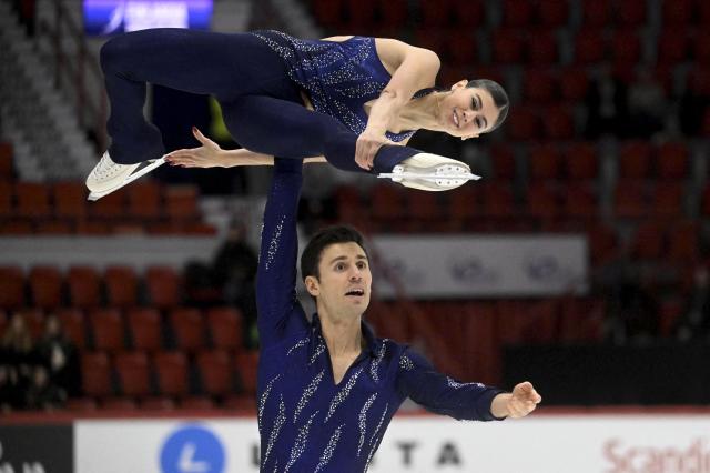 Rebecca Ghilardi and Filippo Ambrosini of Italy perform in Pairs Short Program during the figure skating ISU Grand Prix Finlandia Trophy Helsinki competition in Helsinki, Finland on November 21, 2025. (Photo by Vesa Moilanen / Lehtikuva / AFP) / Finland OUT