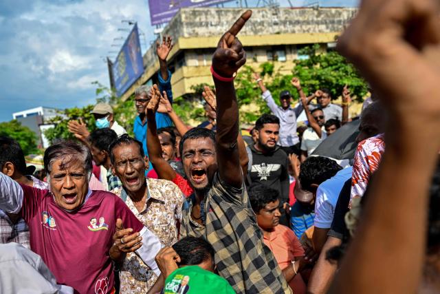 Supporters of the opposition parties take part in a protest rally against the government in Colombo on November 21, 2025. (Photo by Ishara S. KODIKARA / AFP)