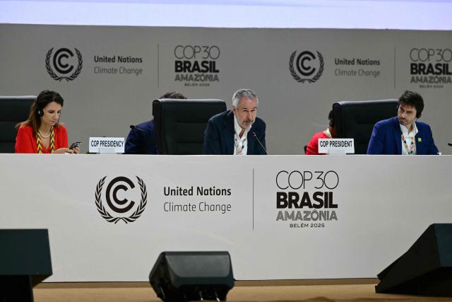 COP30 President Andre Correa do Lago (C) speaks during a plenary session of the COP30 UN Climate Change Conference in Belem, Para state, Brazil on November 21, 2025. Colombia said Friday that the UN climate talks "cannot end" without a roadmap for the global phaseout of fossil fuels after it was omitted from the latest draft agreement unveiled by COP30 host Brazil. (Photo by Pablo PORCIUNCULA / AFP)