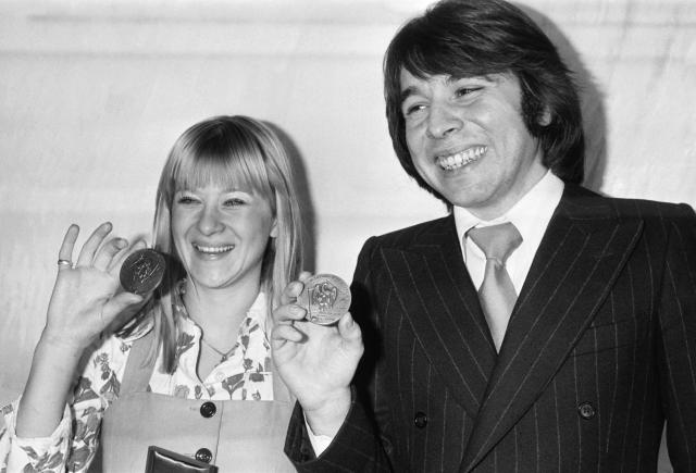 (FILES) Catherine Ferry and Jean Guidoni receives the SACEM trophy in the 1976 French music award, on March 10, 1976. Jean Guidoni has died on November 21, 2025 in Bordeaux, aged 74, reported his press attache to AFP. (Photo by AFP)