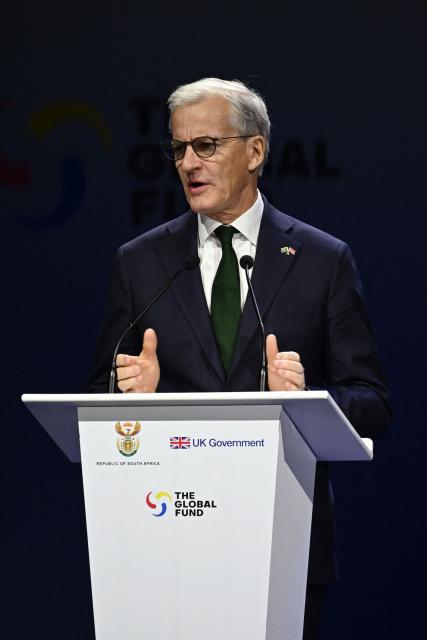 Norway's Prime Minister Jonas Gahr Store speaks during the Global Fund’s Eighth Replenishment Summit at the Sandton Convention Centre in Sandton on November 21, 2025, ahead of the G20 leaders' Summit. (Photo by Leon Neal / POOL / AFP)