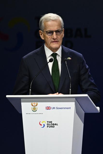 Norway's Prime Minister Jonas Gahr Store speaks during the Global Fund’s Eighth Replenishment Summit at the Sandton Convention Centre in Sandton on November 21, 2025, ahead of the G20 leaders' Summit. (Photo by Leon Neal / POOL / AFP)