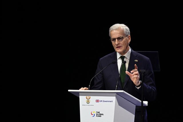 Norway's Prime Minister Jonas Gahr Store speaks during the Global Fund’s Eighth Replenishment Summit at the Sandton Convention Centre in Sandton on November 21, 2025, ahead of the G20 leaders' Summit. (Photo by Leon Neal / POOL / AFP)