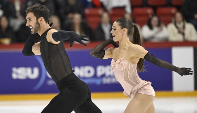 France's Laurence Fournier Beaudry and Guillaume Cizeron perform in the Ice Dance Rhythm Dance session during the figure skating ISU Grand Prix Finlandia Trophy Helsinki, Finland on November 21, 2025. (Photo by Heikki Saukkomaa / Lehtikuva / AFP) / Finland OUT