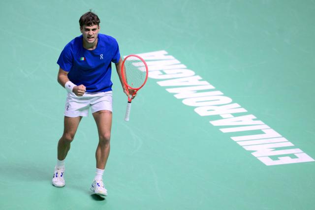 Italy's Flavio Cobolli reacts after a point during his 2025 Davis Cup semi-final single tennis match between Italy and Belgium at the Super Tennis Arena in Bologna, northen Italy, on November 21, 2025. (Photo by Tiziana FABI / AFP)