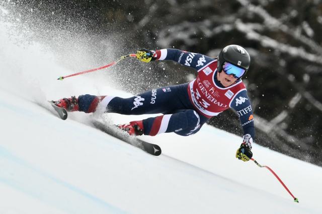 (FILES) US's Breezy Johnson competes during the Women's Super G replacing St Moritz event of FIS Alpine Skiing World Cup in La Thuile, Italy on March 14, 2025. American Breezy Johnson, crowned world downhill champion last winter, expects the toughest race in history next February at the Olympic Games in Cortina d'Ampezzo, Italy. (Photo by Marco BERTORELLO / AFP)