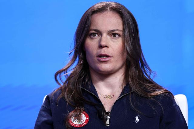 (FILES) US skier Breezy Johnson speaks during the Team USA Media Summit ahead of the Olympic and Paralympic Winter Games Milano Cortina 2026 at the Javits Center, in New York City on October 29, 2025. American Breezy Johnson, crowned world downhill champion last winter, expects the toughest race in history next February at the Olympic Games in Cortina d'Ampezzo, Italy. (Photo by CHARLY TRIBALLEAU / AFP)