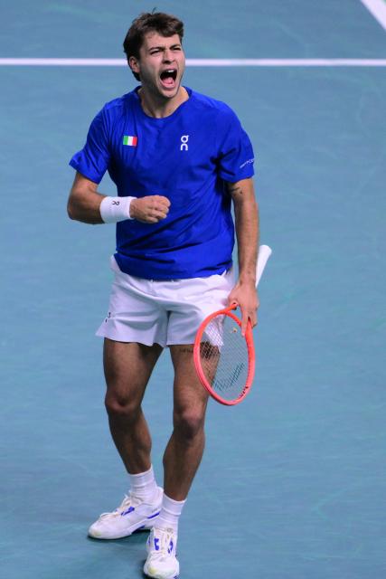 Italy's Flavio Cobolli reacts after a point during his 2025 Davis Cup semi-final single tennis match between Italy and Belgium at the Super Tennis Arena in Bologna, northen Italy, on November 21, 2025. (Photo by Tiziana FABI / AFP)