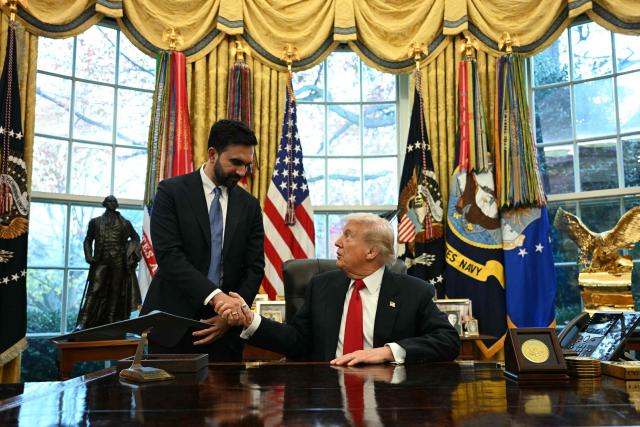 US President Donald Trump (R) shakes hands with New York Mayor-elect Zohran Mamdani as they meet in the Oval Office of the White House in Washington, DC, on November 21, 2025. (Photo by Jim WATSON / AFP)
