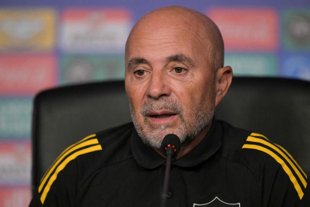 Atletico Mineiro’s Argentine head coach Jorge Sampaoli speaks during a press conference at the Defensores del Chaco Stadium in Asuncion on November 21, 2025, ahead of the Copa Sudamericana final football match between Argentina’s Lanus and Brazil’s Atletico Mineiro. (Photo by JUAN MABROMATA / AFP)