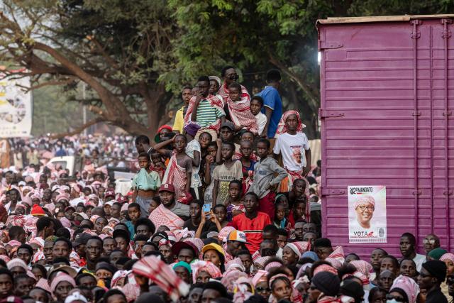 Supporters of Guinea-Bissau's President and presidential candidate Umaro Sissoco Embalo gather during his final campaign rally ahead of general elections, in Bissau, on November 21, 2025. Guinea-Bissau votes in general elections on November 23, 2025. (Photo by PATRICK MEINHARDT / AFP)