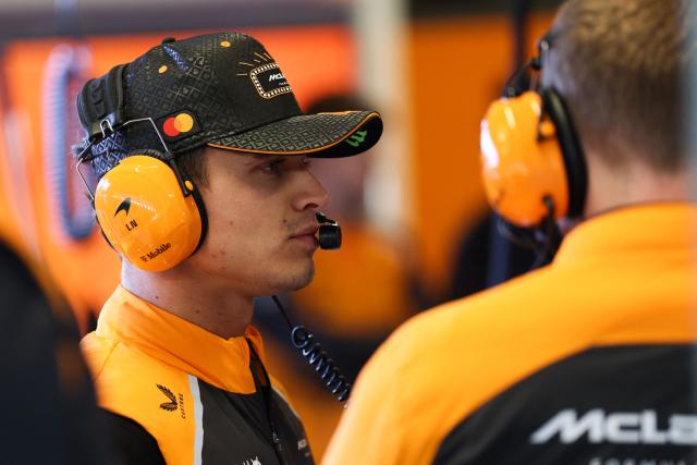 McLaren's British driver Lando Norris looks on in his garage before the start of the third practice session for the Las Vegas Formula One Grand Prix at the Las Vegas Strip Circuit in Las Vegas, Nevada, on November 21, 2025. (Photo by Patrick T. Fallon / AFP)