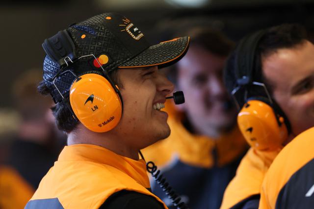 McLaren's British driver Lando Norris talks with teammates in the garage before the start of the third practice session for the Las Vegas Formula One Grand Prix at the Las Vegas Strip Circuit in Las Vegas, Nevada, on November 21, 2025. (Photo by Patrick T. Fallon / AFP)