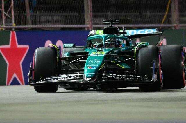 Aston Martin's Canadian driver Lance Stroll races during the third practice session for the Las Vegas Formula One Grand Prix at the Las Vegas Strip Circuit in Las Vegas, Nevada, on November 21, 2025. (Photo by Frederic J. Brown / AFP)